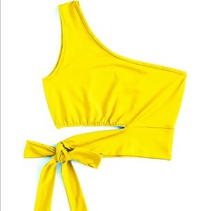 Yellow one shoulder cut out tied crop top